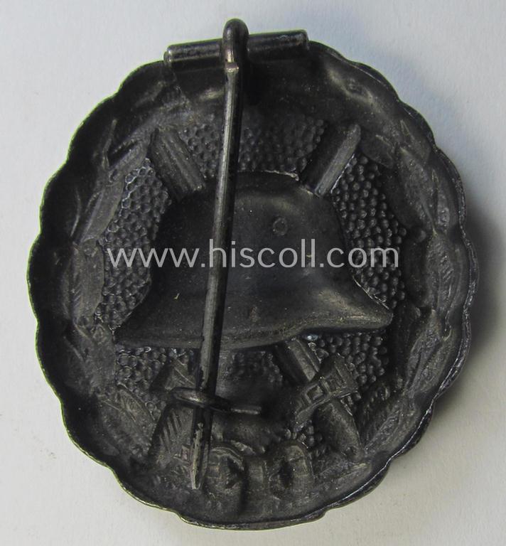WWI-pattern, black-class wound-badge (ie.: 'Verwundeten Abzeichen in Schwarz') being a very detailed (and magnetic) example that comes in a just minimally used- ie. worn, condition