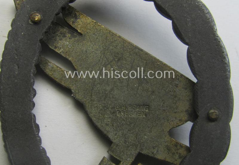 Zinc- (ie. 'Feinzink'-) based version of a WH (Luftwaffe) 'Fallschirmschützen-Abzeichen' (being a maker-marked, 'Type A'-pattern example as was produced by the 'G.H. Osang'-company)