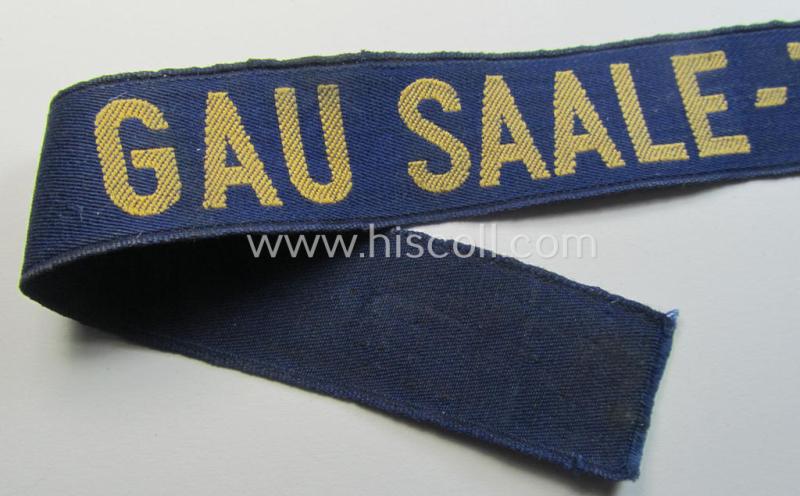 Attractive, bluish-coloured- and typical linnen-based 'Der Stahlhelmbund' (ie. 'Der Stahlhelm' - Bund der Frontsoldaten (or: Sta)' cuff-title (ie. 'Ärmelstreifen') entitled: 'Gau Saale-Thüringen'