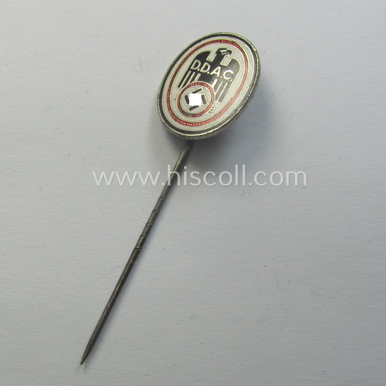 Silver-toned- and/or neatly enamelled, so-called: DDAC (ie. 'Der Deutsche Automobil Club') membership-lapel-pin (or: 'Mitgliedsabzeichen Gross') being a non-maker- albeit 'Ges.Gesch.'-marked example