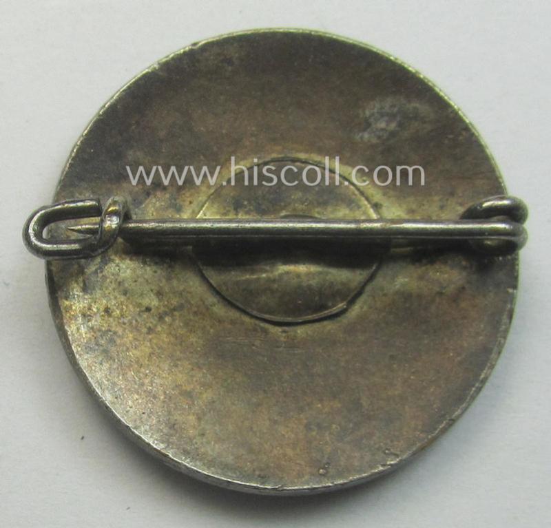 'N.S.D.A.P. - Parteiabzeichen' being an early pattern example that is totally void of a makers- (nor 'Ges.Gesch.'-patent-pending-) designation