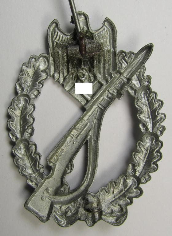 'Infanterie Sturmabzeichen in Silber', being an unmarked (and/or very converse- ie. vaulted-) 'hollow-back' example by the maker: 'Friedrich Linden' (ie. 'F.L.L.') as was executed in silver-coloured, zinc-based metal (ie. 'Feinzink')