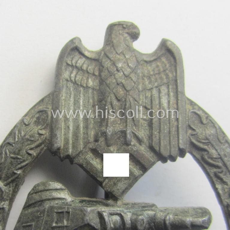 'Panzerkampfabzeichen in Bronze' being a clearly maker- (ie. 'KWM'-) marked (and/or: typical zinc- ie. 'Feinzink'-based-) example as was procuced by the: 'Karl Würster'-company
