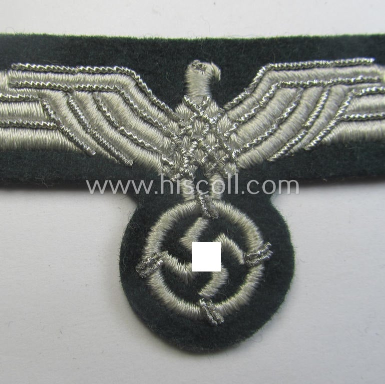 'Variant'-pattern, WH (Heeres) officers'-type, machine-embroidered breast-eagle (ie. 'Brustadler für Offiziere') as was executed in bright-silverish-coloured linnen ie. braid as was intended for usage on the various officers'-pattern tunics