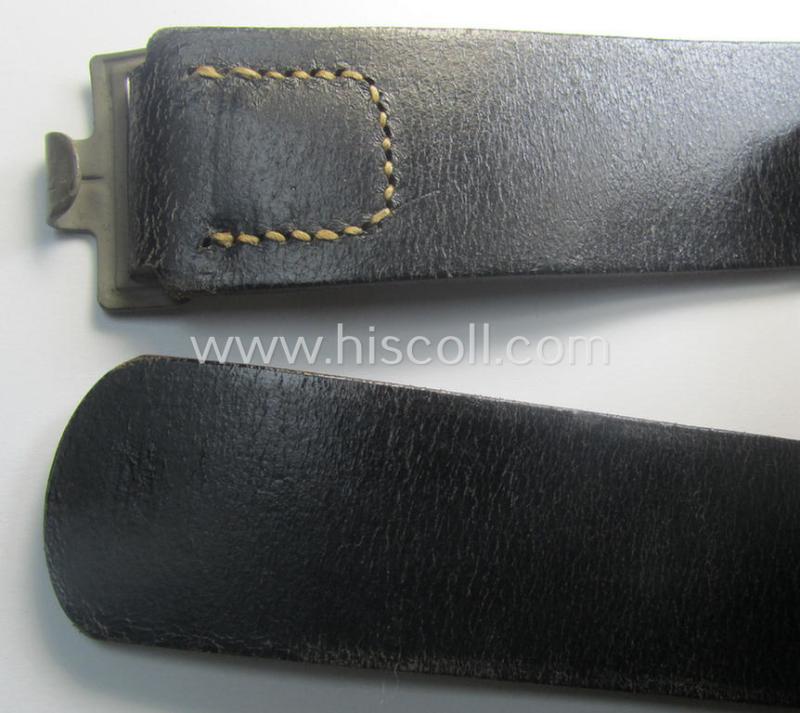 Hardly used, early- (ie. mid-) war-period, black-coloured WH (Heeres, Luftwaffe, Waffen-SS etc.) 'standard-issue'-pattern belt (ie. 'Koppelriemen') being a 100 cms. sized example that shows a (clear) makers'-designation and/or date: '1941'