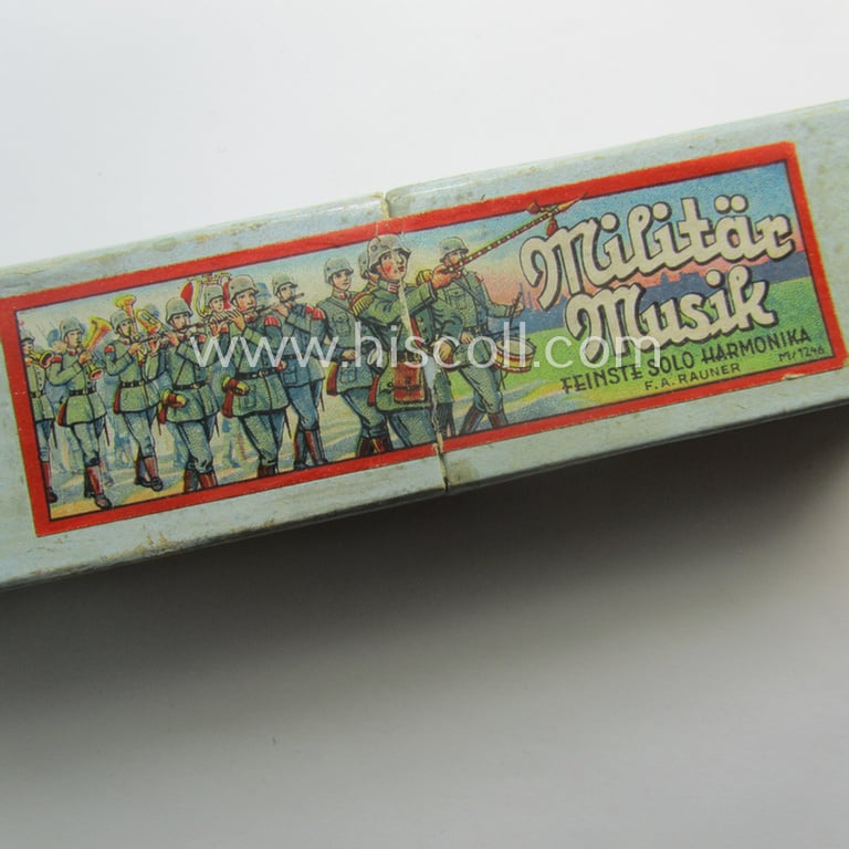 Superb - and still 'virtually mint ie. unissued'! - TR-era- (ie. 'Deutsche Wehrmacht'-) related harmonica entitled: 'Miltär Musik' that came stored in its original and/or carton-based box ie. etui