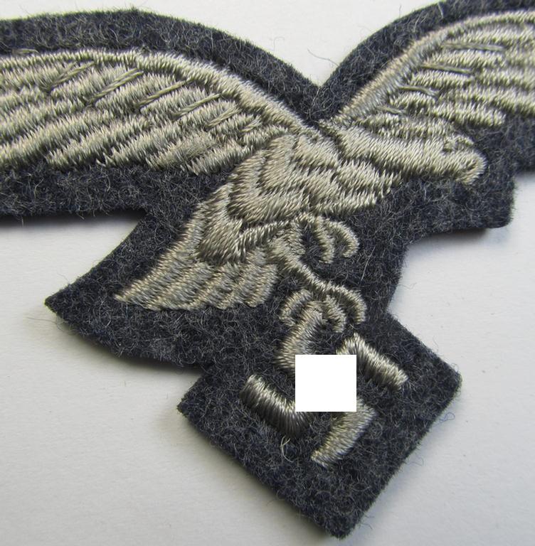 Neat, 'mint- ie. unissued' example of a WH (Luftwaffe) 'standard-issue'-pattern breast-eagle (ie. 'Brustadler für Mannschaften u. Uffz. der Luftwaffe') being a machine-embroidered example as was worn throughout the war