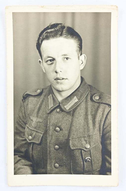 German Hitler Youth Shooting Badge with Portrait Picture and Shooting Booklet.