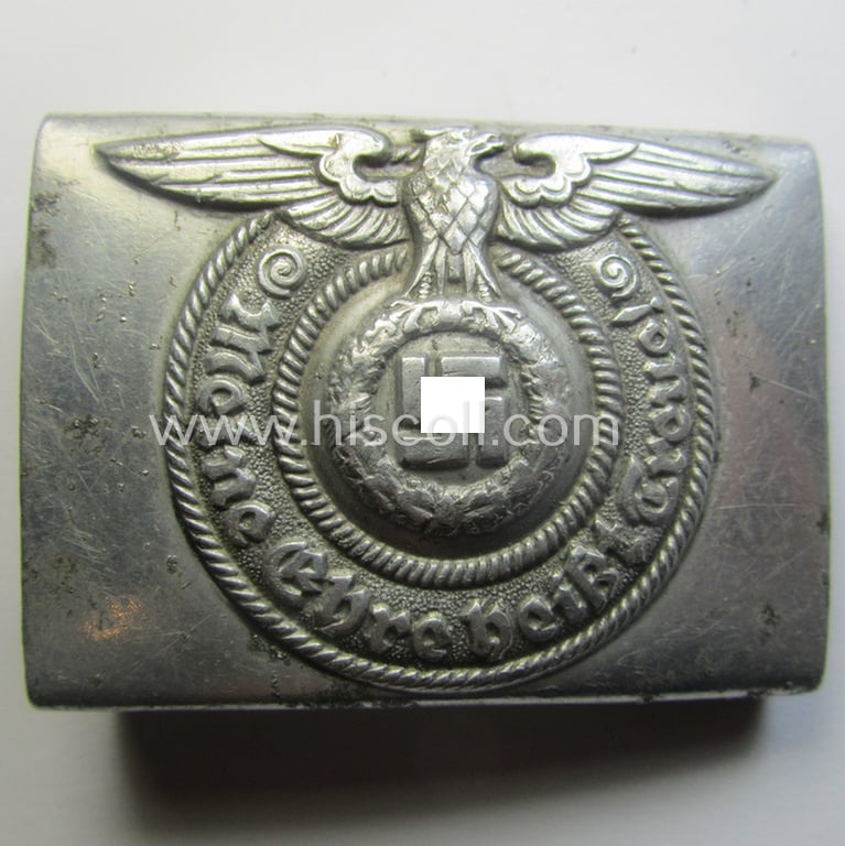 Attractive, SS- (ie. Waffen-SS), aluminium-based enlisted-mens'- (ie. NCO-type-) belt-buckle being a neatly maker- (ie. 'RzM - 822/38 SS'-) marked example that comes in a clearly used- ie. worn, condition