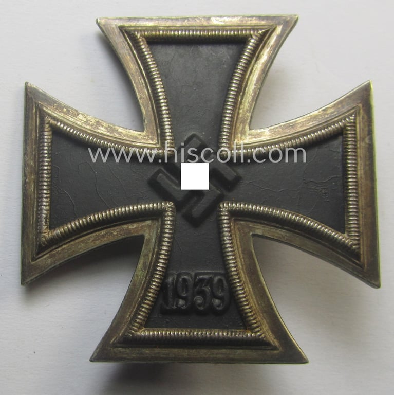 'Eisernes Kreuz 1. Kl.' (or: Iron Cross 1st class) being a (typical) maker- (ie. 'L/13'-) marked example as was produced by the maker (ie. 'Hersteller'): 'Paul Meybauer' and that comes in its original etui as issued