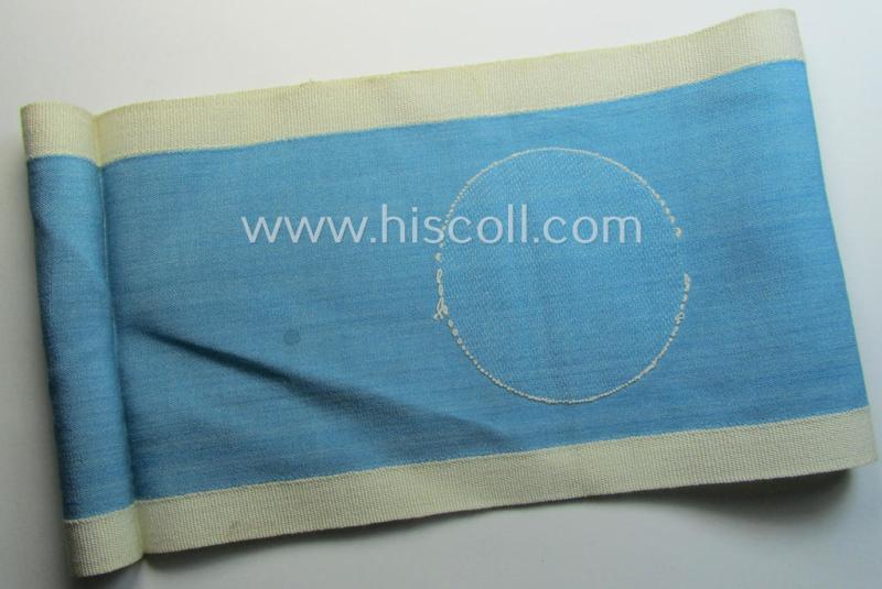 Linnen-based- and/or light-blue-coloured armband (ie. 'Armbinde') depicting an interwoven white-toned circle (ie. dot-) and dito white-coloured borders as was intended for usage by a: 'Luftschutzwart des Reichsluftschutz-Bundes'