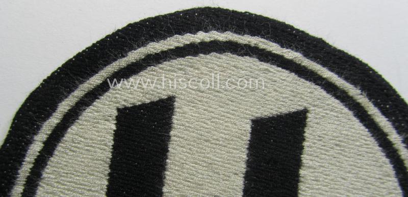 Waffen-SS sport-shirt emblem as executed in the neat 'BeVo'-weave pattern that is void of an: 'RzM'-etiket and that comes in an overall nice- (ie. moderately used- ie. tunic-attached-), condition