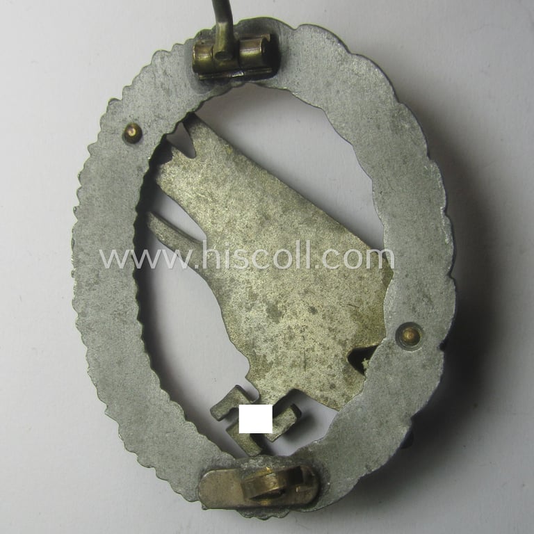 Zinc- (ie. 'Feinzink'-) based version of a WH (Luftwaffe) 'Fallschirmschützen-Abzeichen' (being a non-maker-marked, 'Type A'-pattern example as was produced by the 'Steinhauer & Lück'-company)