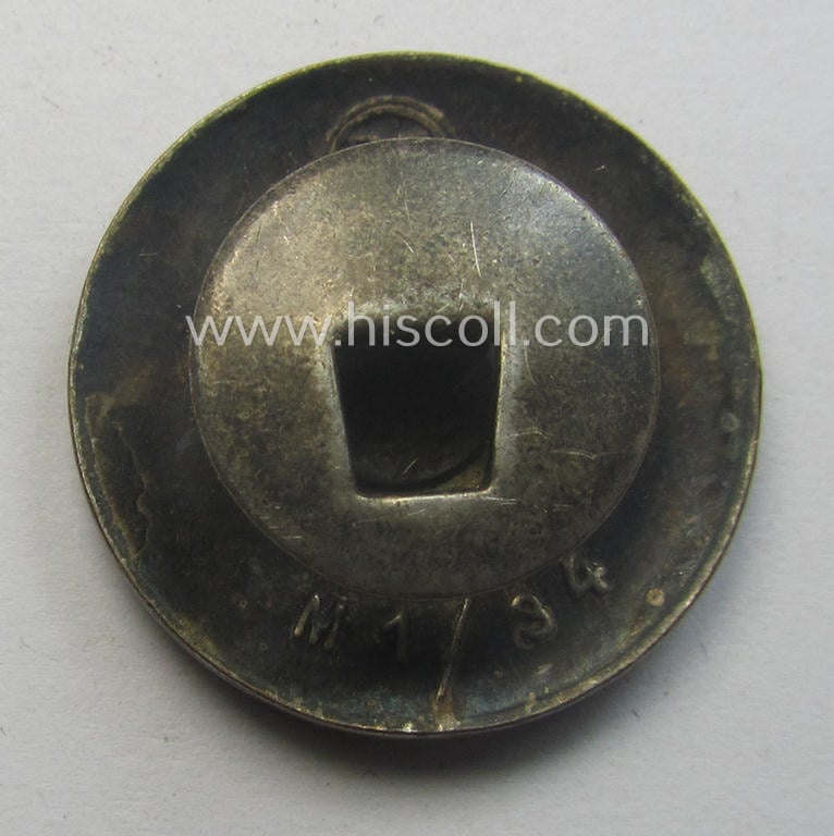 Neatly enamelled- (and bright-red-coloured!) 'N.S.D.A.P.'-membership-pin- ie. party-badge (or: 'Parteiabzeichen') which is nicely maker-marked on the back with the makers'-designation: 'RzM' and/or: 'M1/34'