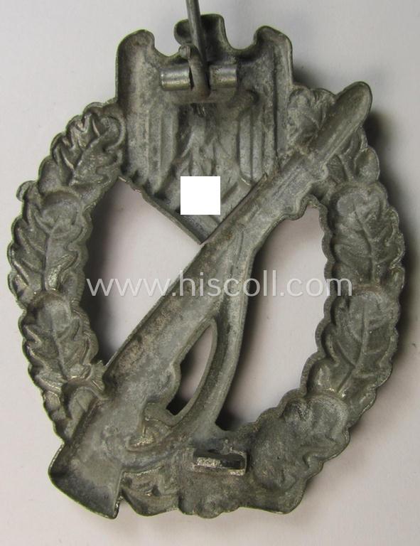 Attractive, 'Infanterie Sturmabzeichen in Silber', being an unmarked (and minimally converse- ie. vaulted-) 'hollow-back' example as was executed in silver-coloured, zinc-based metal (ie. 'Feinzink') as produced by the maker: 'Schauerte & Höhf...