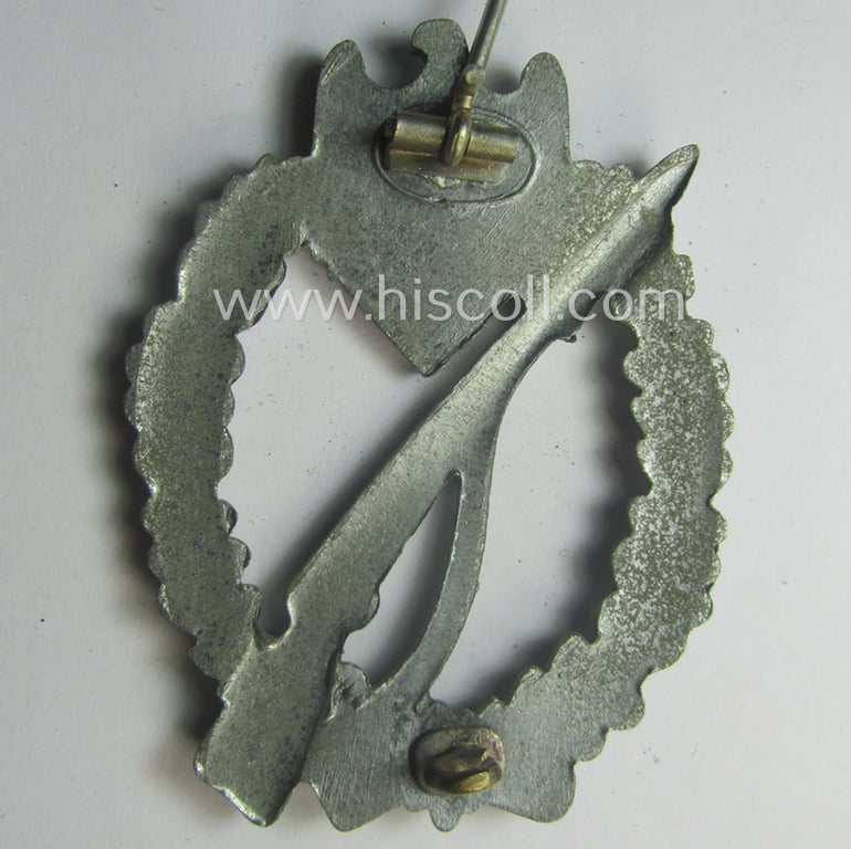 Superb, 'Infanterie Sturmabzeichen in Silber' being a non-maker-marked and/or typical zinc- (ie. 'Feinzink'-) based version (ie. 'crimped scooped rifle-variant') as was (I deem) procuded by the: 'S&L'- (ie. 'Steinhauer u. Lück'-) company