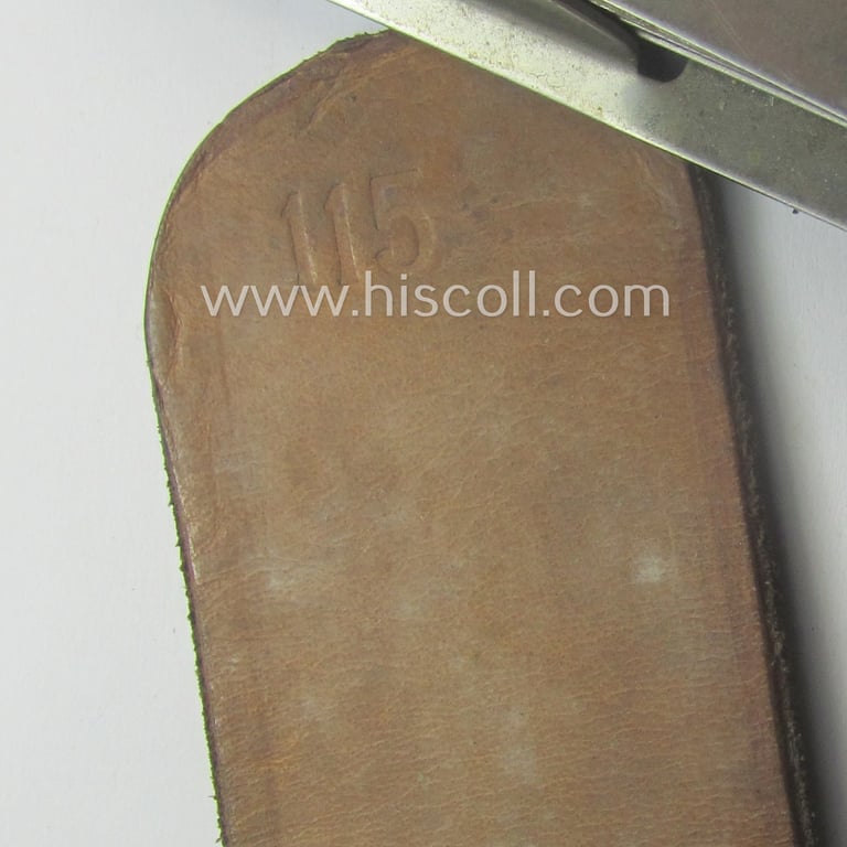 Hardly used, early- (ie. mid-) war-period, black-coloured WH (Heeres, Luftwaffe, Waffen-SS etc.) 'standard-issue'-pattern belt (ie. 'Koppelriemen') being a 115 cms. sized example that shows a (clear) makers'-designation and/or date: '1942'