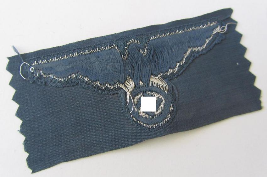 Attractive, BZP (ie. 'Bahnschutz-Polizei') officers'-/ie. NCO-type side-cap (ie. 'Schiffchen') eagle, as executed in woven silver thread (ie. 'flatwire-style') on a greyish-blue-coloured- and linnen-based background 