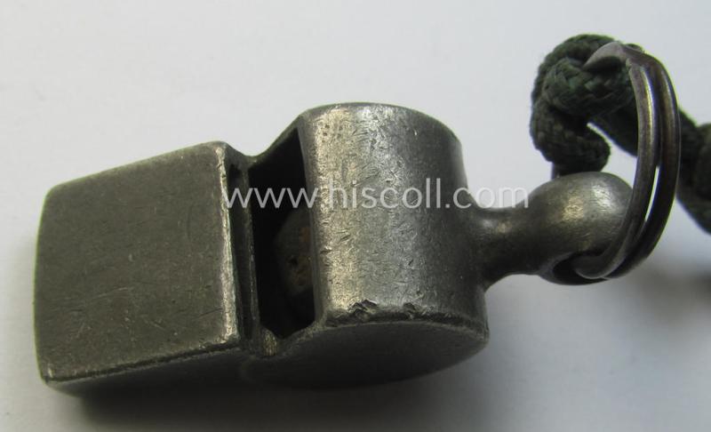 WH (Heeres, Kriegsmarine etc.) personal-equipment-item: a zinc-based flute (ie. 'Dienstflöte') onto its original (greenish-coloured- and/or twisted) lanyard