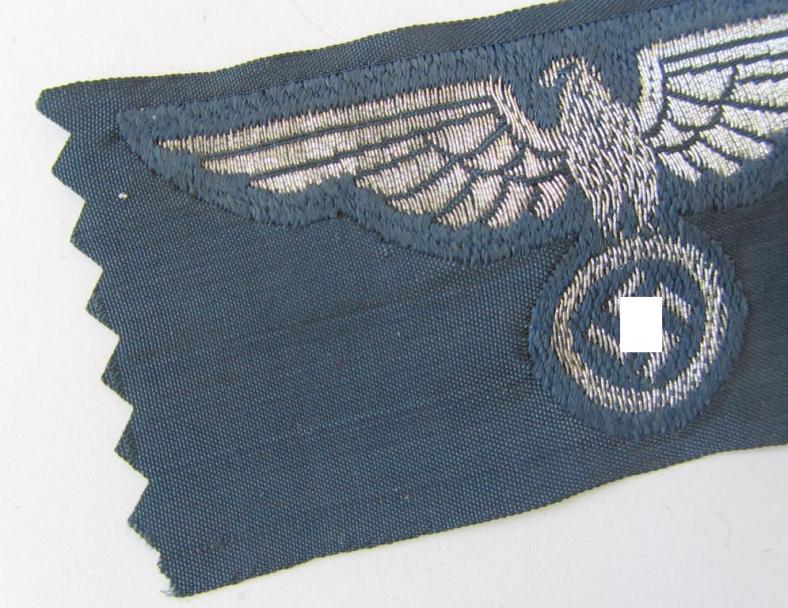 Attractive, BZP (ie. 'Bahnschutz-Polizei') officers'-/ie. NCO-type side-cap (ie. 'Schiffchen') eagle, as executed in woven silver thread (ie. 'flatwire-style') on a greyish-blue-coloured- and linnen-based background 
