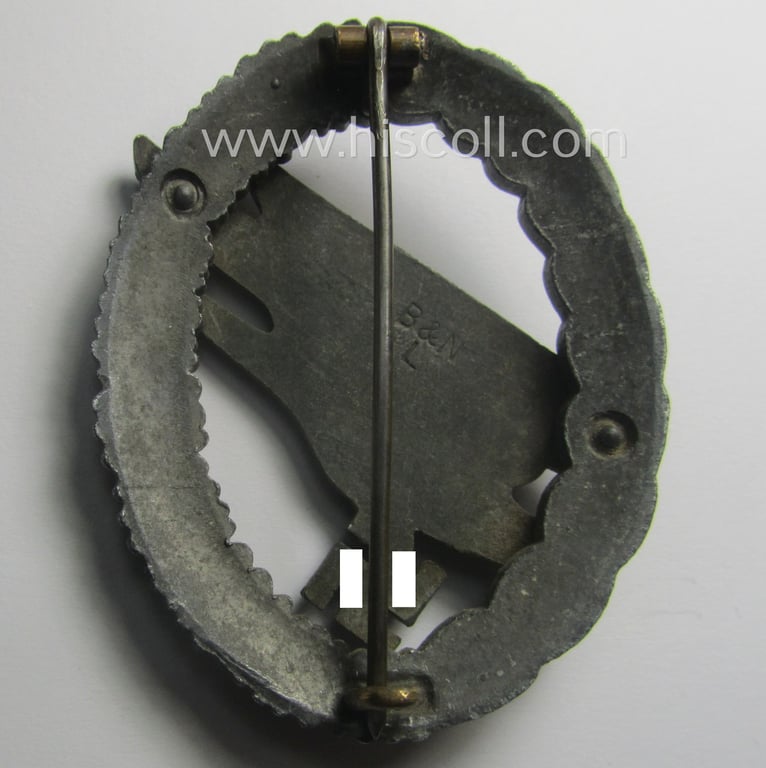WH (Luftwaffe) 'Fallschirmschützen-Abzeichen' (or: paratroopers-jumpbadge) being a maker- (ie. 'B&N - L'-) marked- and typical zinc- (ie. 'Feinzink'-) based example by: 'Berg u. Nolte'