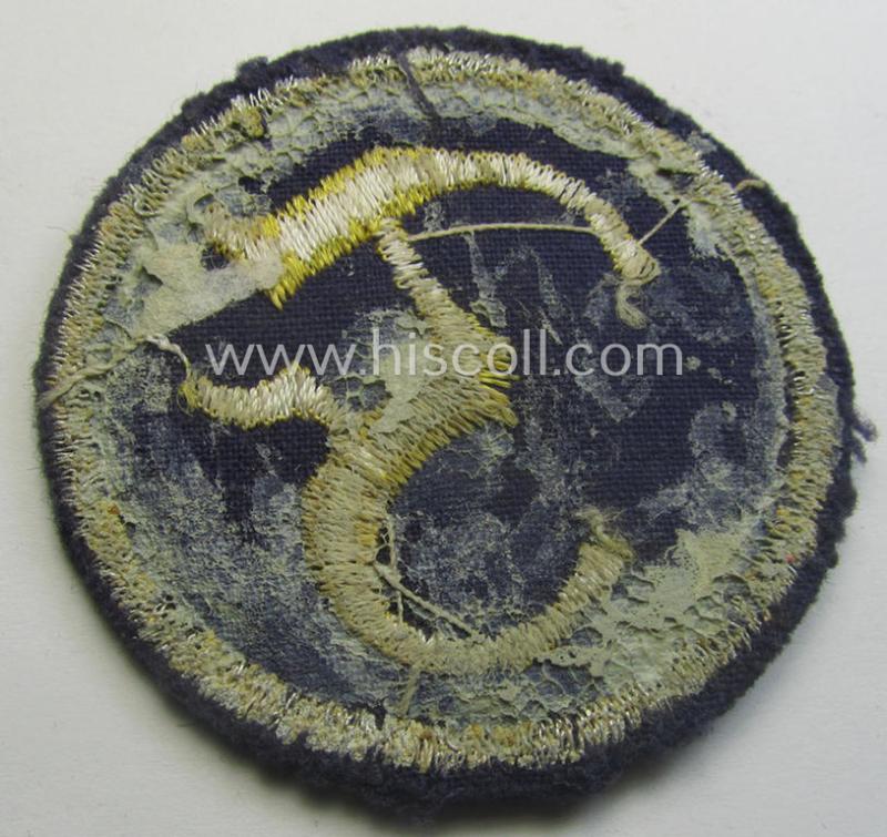 Truly used- and/or worn, WH (Heeres) machine-embroidered, trade- and/or special-career insignia (ie. 'Tätigkeitsabzeichen') as executed on a darker-green-coloured background as was intended for a: 'geprüfter Feuerwerker'