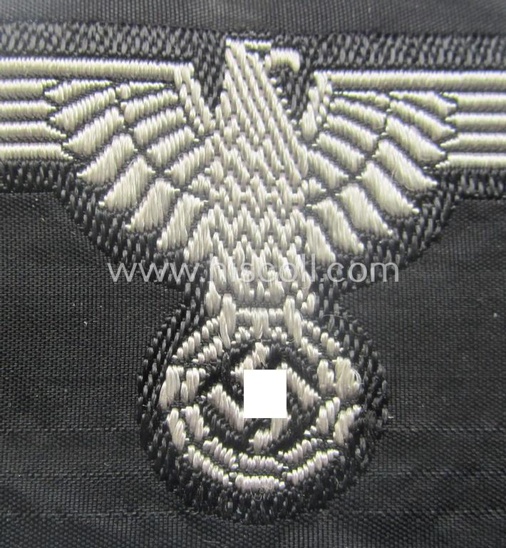Mid- (ie. later-war-) pattern, 'SS' (ie. 'Waffen-SS') so-called: 'BeVo-weave-style', enlisted-mens'- ie. NCO-pattern arm-eagle (ie. 'Ärmeladler für Mannschaften u. Unterführer') as was intended for usage by the various Waffen-SS-troops