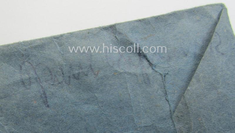 'EK II. Klasse'-set comprising of a non-maker-marked specimen that comes with its ribbon (ie. 'Bandabschnitt') and 'Zellstoff'-based pouch as produced by the company: 'L.Chr. Lauer' (ie. 'Hersteller 14')