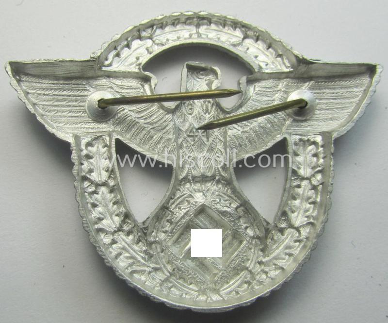 'Standard-issue'-pattern - and typical aluminium-based - 'Polizei'- (ie. police) visor-cap eagle being a bright-silver-coloured- and maker- (ie. 'G.W. 41'-) marked example as was intended for usage on the various 'Polizei' (ie. police) visor-...