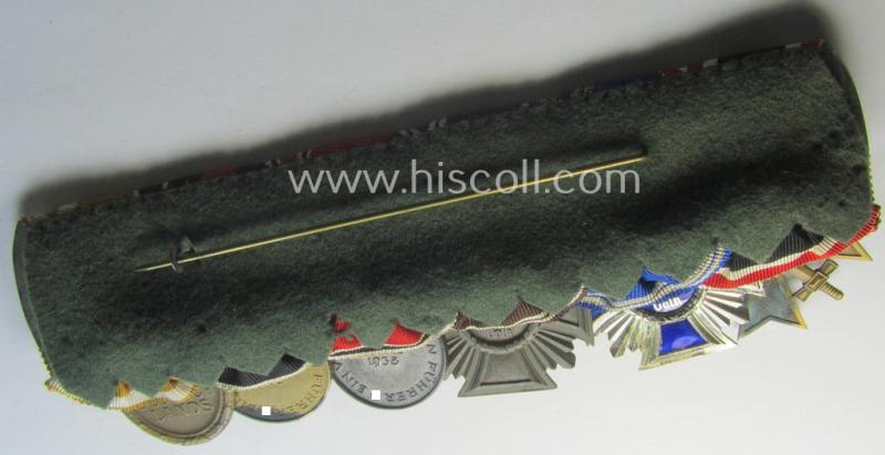 6-pieced N.S.D.A.P.-related 'Ordenspange' showing a: 'KvK II.Kl. m. S.', a: D.A. in Silber' (ie. '2. Stf. für 15 Jahre t.D.'), a: 'D.A. in Bronze' (ie. '3. Stf. für 10 Jahre t.D.') two 'Anschluss'-medals and a: 'Westwall'-medal