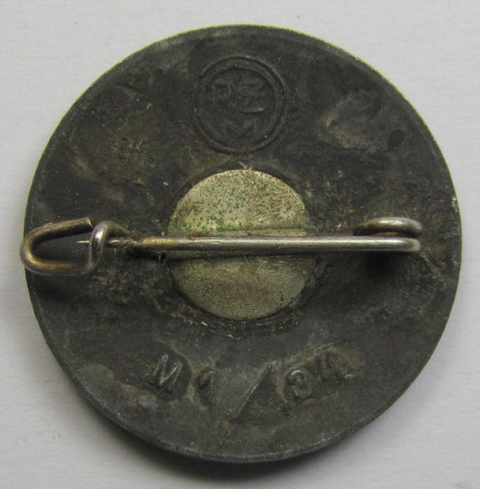 Non-enamelled (ie. painted) bright-red-coloured- and/or 'variant'-pattern 'N.S.D.A.P.' membership-pin- ie. party-badge (or: 'Parteiabzeichen') which is nicely maker-marked on the back with the makers'-designation: 'RzM' and/or: 'M1/34'