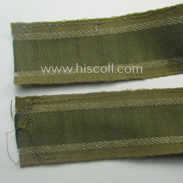 'BeVo'-like cuff-title (ie. 'Ärmelstreifen') entitled: 'Afrikakorps' being a clearly issued example that comes in an overall nice- (ie. hardly shortened- and just moderately worn-), condition