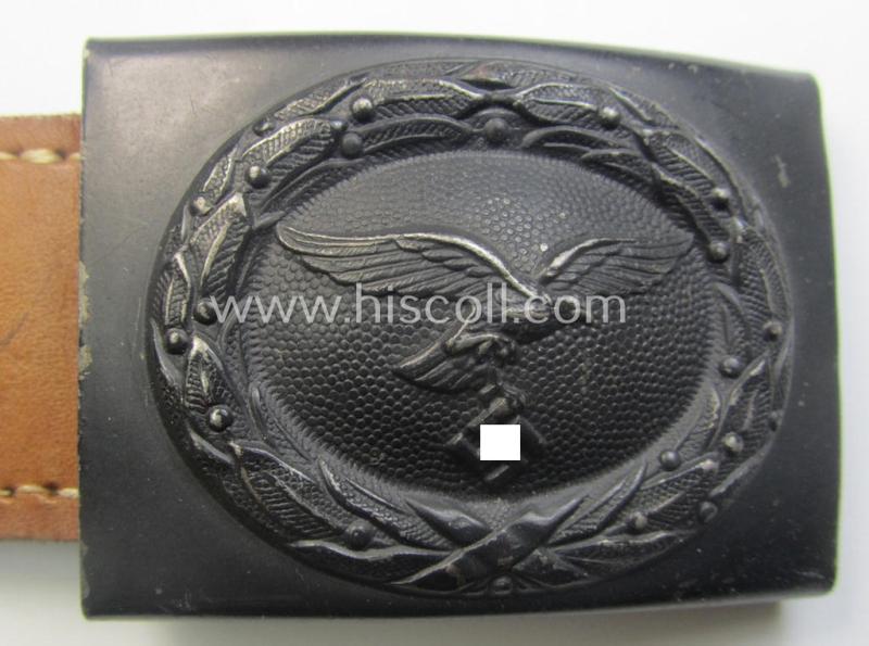 'Virtually mint', 'standard-issue'-pattern, WH (Luftwaffe) bluish-grey-toned- and steel-based belt-buckle being a non-maker-marked example that comes mounted onto its 'Berg u. Nolte A.G.'-marked and/or '1941'-dated tab