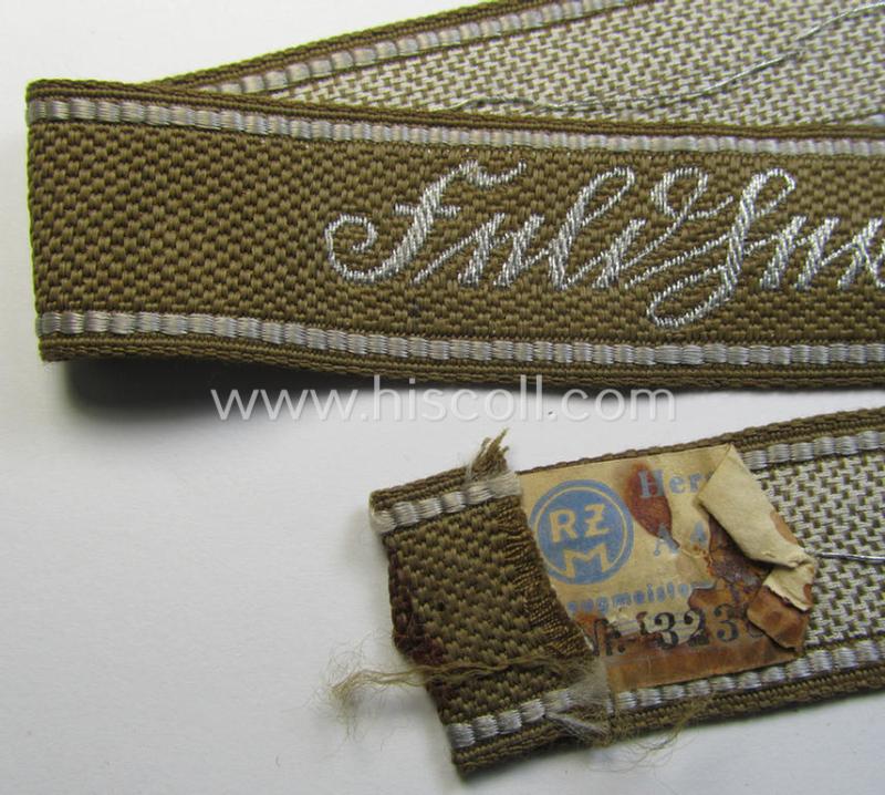 Superb, WH (Heeres) neatly 'BeVo'-flat-wire-woven 'FHH-Ärmelstreifen' (ie. cuff-title) as was intended for an officer- (ie. NCO) who served within the: '60. Pz-Gren.-Div.' “Feldherrnhalle”