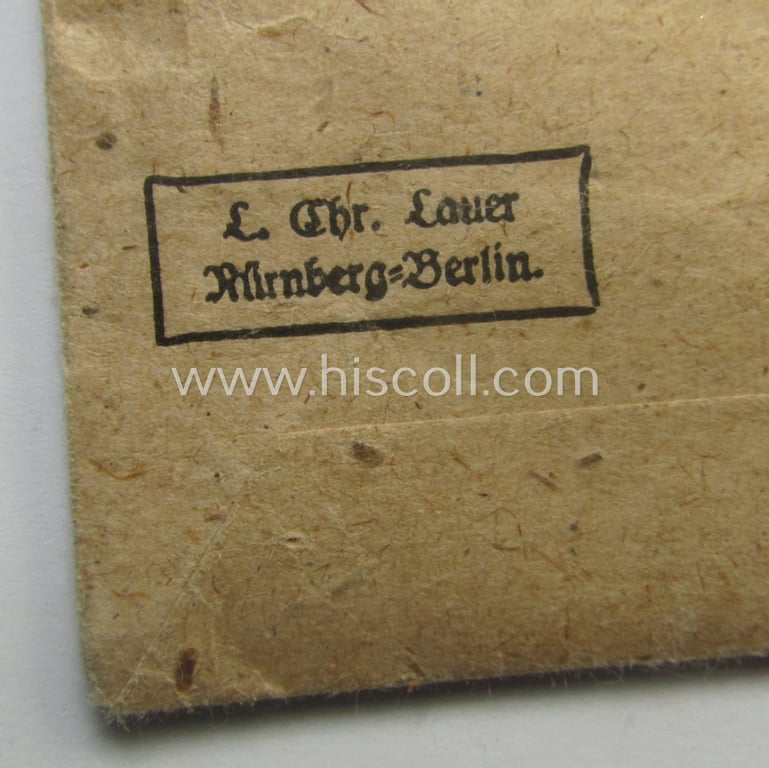 Fully complete, 'Feuerwehr-Ehrenzeichen der II. Stufe' that comes together with its period piece of ribbon (ie. 'Bandabschnitt') and (rarely seen!) period, 'Zellstoff'-based pouch as issued and/or recently found