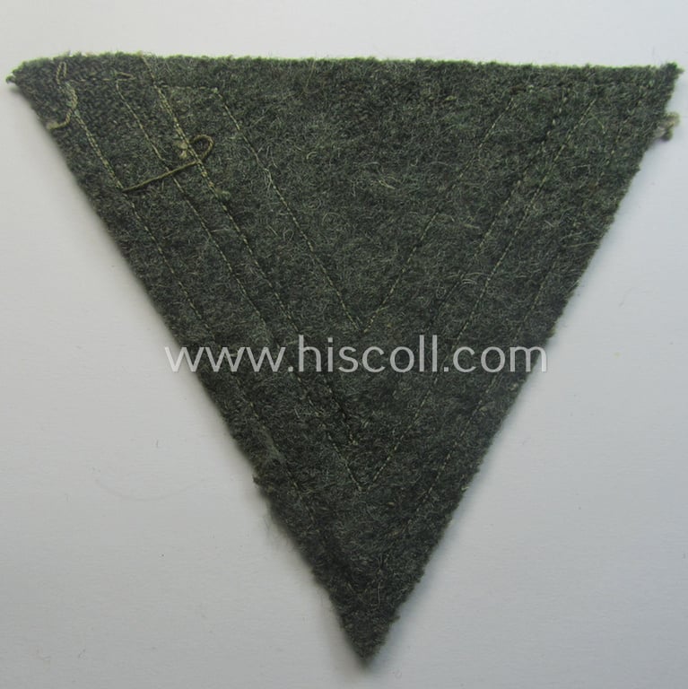 WH (Heeres) 'Armwinkel' (or: arm-chevron) as executed on typical field-grey-coloured wool as was specifically intended for usage by a soldier with the rank of: 'Obergefreiter'