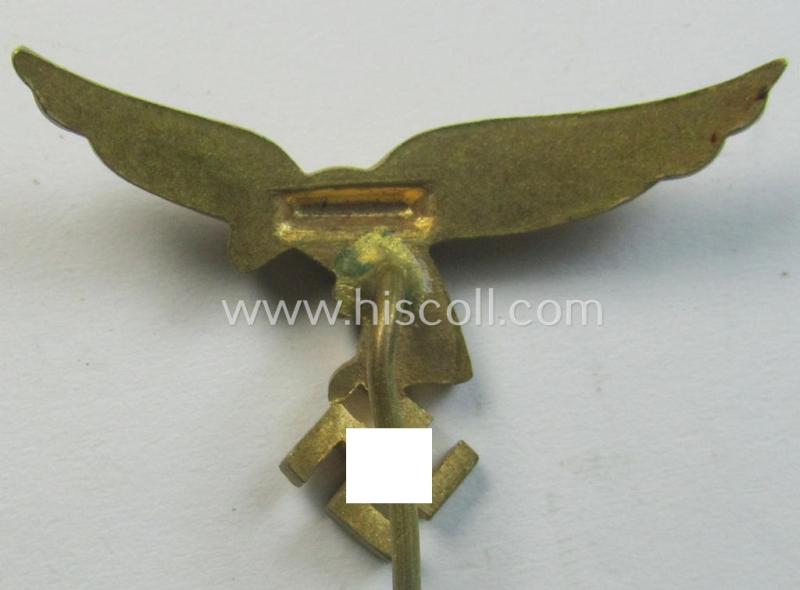 Bright-golden-toned lapel-pin (ie. 'Zivilabzeichen') to be worn on the civil attire as was intended for usage by the various staff-members of the 'Luftwaffe' (depicting an early-pattern- ie. 'down-tailed'-eagle)