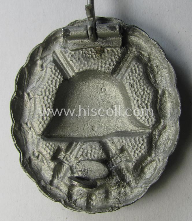 WWI-pattern, steel-based silver-class wound-badge (ie.: 'Verwundeten Abzeichen in Silber') being a detailed (and magnetic) example that comes in a moderately used- ie. most certainly worn, condition