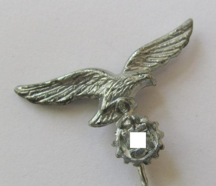 Attractive - and actually scarcely encountered! - so-called: Lufwaffe- (ie. 'Heimat- u. Alarmflak-Artillerie'-) related, silver-toned membership-badge (ie. 'Mitglieds-Zivilabzeichen') that comes mounted onto its long-sized pin