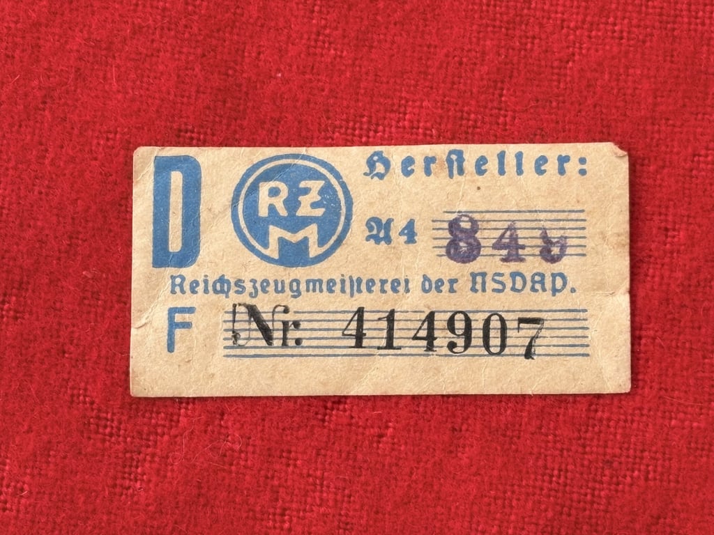 WWII GERMAN POLITICAL LEADERS’ THIRD REICH NAZI ARMBAND WITH RZM PAPER TAG.