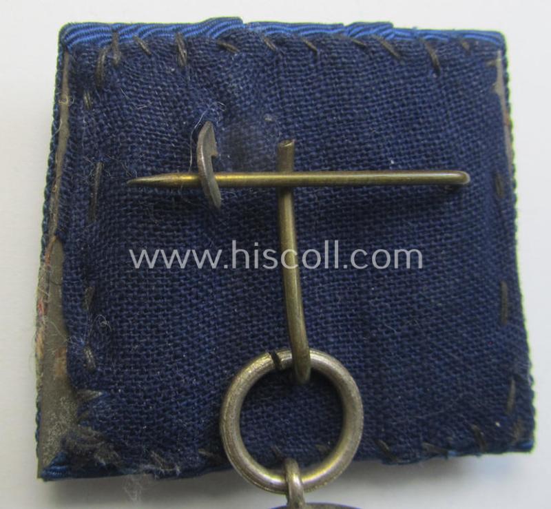 Attractive, bright silver-toned WH (Luftwaffe) so-called: 'Einzelspange' showing a: 'WH-Dienstauszeichnung 4. Stufe' (as was intended for 4 years of loyal-service) and that shows a detailed, Luftwaffe-type-eagle-device, period-attached