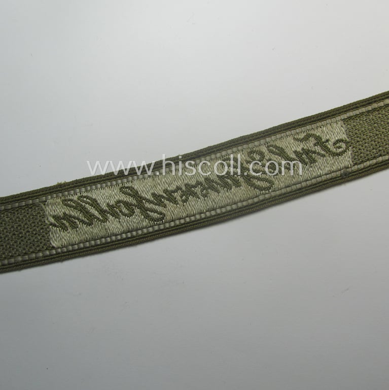 Truly used- and/or tunic-removed - almost full length and scarcely encountered! - WH (Heeres) 'BeVo'-woven: 'FHH-Ärmelstreifen' (ie. cuff-title) as was intended for the soldiers- (ie. NCOs) serving within the: '60. Pz-Gren.-Div. “Feldherrnhalle”