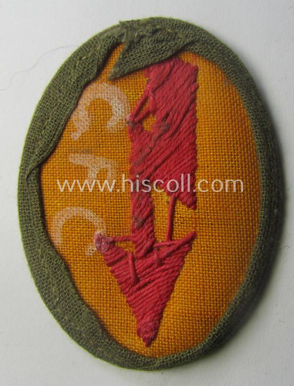 WH (Heeres) 'tropical-styled', trade- and/or special-career insignia (or: 'Signal Blitz') as was intended for a soldier who served within the: 'Pz- o. Panzerjäger-Trpn.'