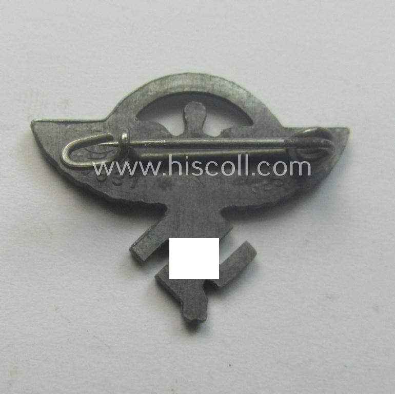N.S.F.K.- (or: 'National Socialistisches Flieger Korps'-) related civil-attire badge (ie. 'Zivilabzeichen') being a neat maker- (ie. 'GB'- ie. '9837'-) marked example that is bearing a patent-pending- (ie. 'Ges.Gesch.'-) designation on its...
