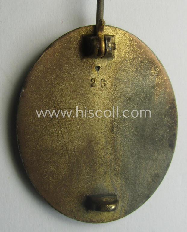 Zinc- (ie. 'Feinzink'-) based and/or clearly maker- (ie. '26'-) marked example of a 'Verwundeten-Abzeichen in Gold' (ie. golden-class wound-badge) as was produced by the maker: 'B.H. Mayer's Kunstprägeanstalt'