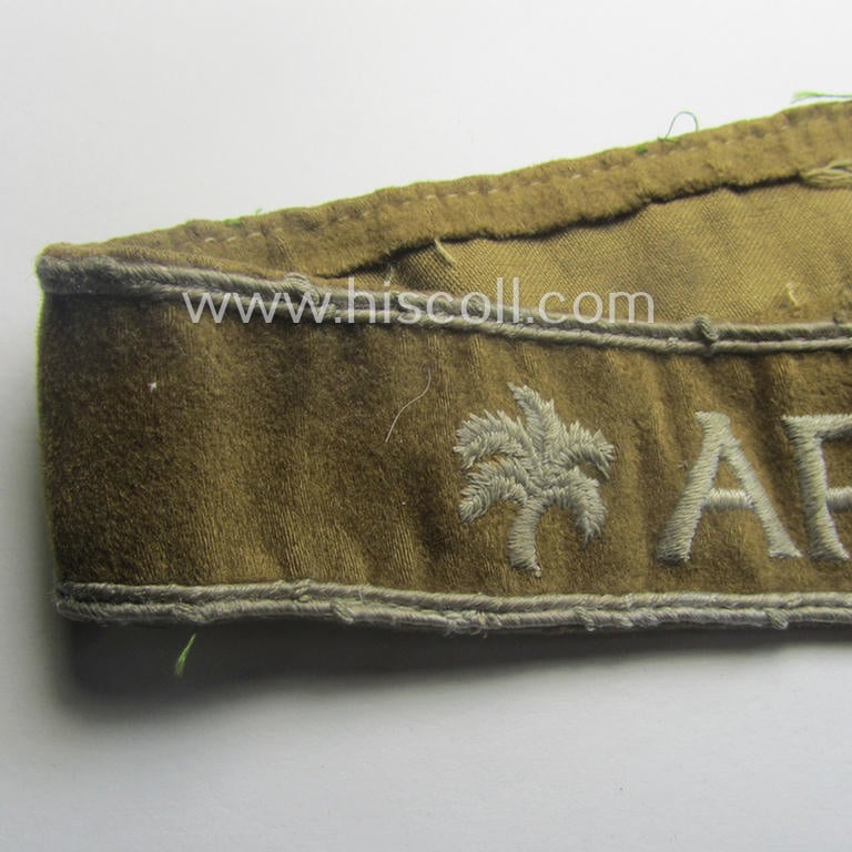 Cleary worn WH cuff-title (ie. 'Ärmelstreifen') entitled: 'Afrika' (being a minimally shortened example that comes in an overall very nice- (ie. issued and clearly worn ie. once tunic-attached-), condition