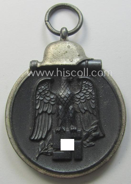 Neatly maker- (ie. '110'-) marked medal: 'Winterschlacht im Osten 1941/42' in its period pouch by the company: 'Otto Zappe'