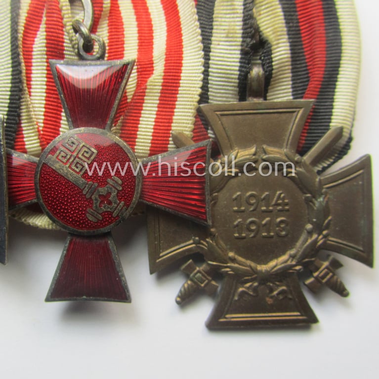 Three-pieced, 'WWI'-related medal-bar (ie. 'Ordenspange') resp. depicting a WWI-period: 'EK II.Kl.', a neatly enamelled 'Hanseatenkreuz Bremen' and a: 'FKK 1914-18 mit Schwn.'
