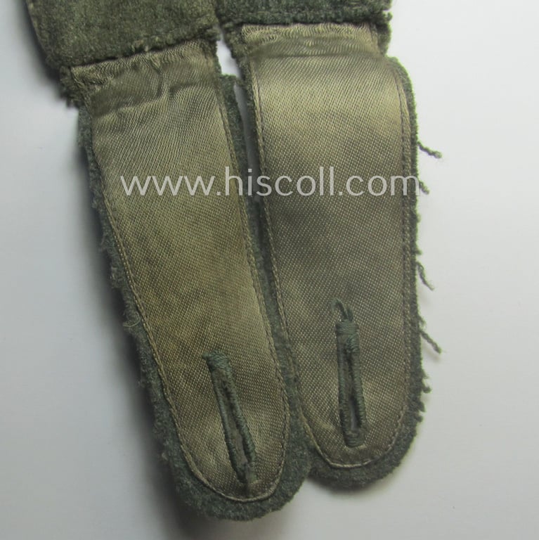 Moderately used pair of WH (Heeres), early- (ie. mid-) war-period- (ie. 'M41- o. M43'-) pattern EM-type shoulderstraps as piped in the white-coloured branchcolour as was intended for a: 'Soldat eines Infanterie-Rgts.'