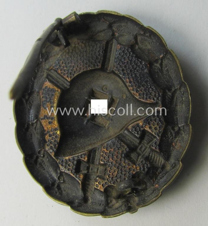 Attractive, early-pattern black-class wound-badge (ie.: 'Verwundeten Abzeichen in Schwarz') being a detailed so-called: 'Spanish Civil-War'-version that comes in a truly used- and/or worn, condition